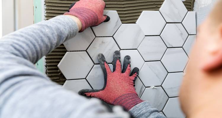 hexagonal tiles being stuck on