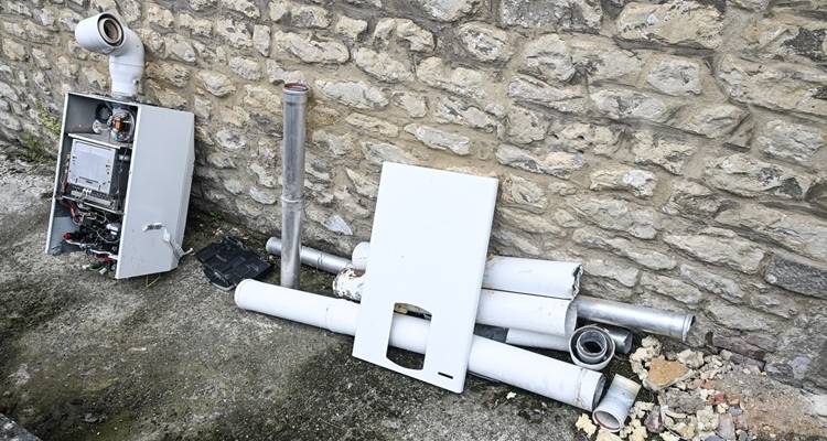 old boiler against a wall