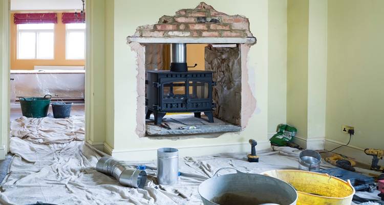 log burner black installation in wall