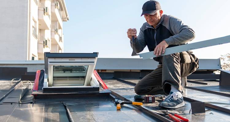 contractor fitting metal roof