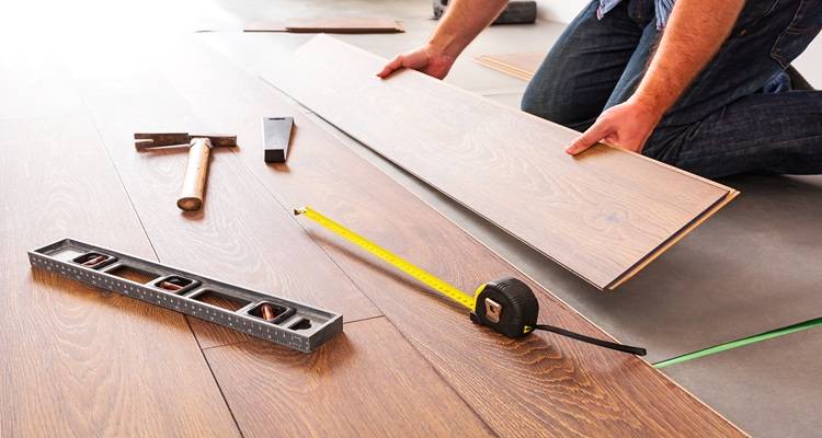 measuring tape tools laminate being laid