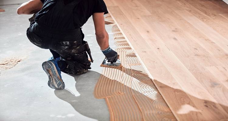 laminate being laid with glue