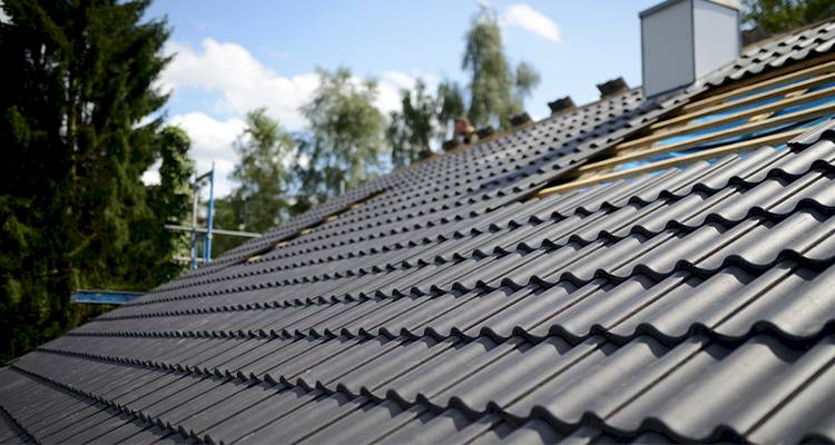 a black roof that has just been replaced