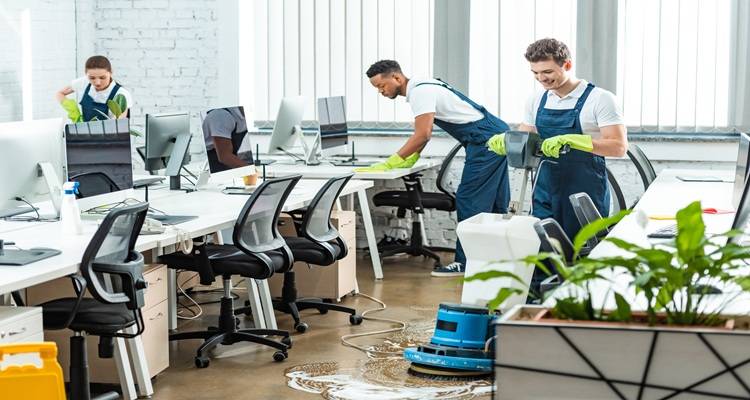three cleaners in office
