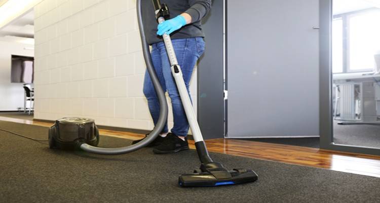 office carpet being vacuumed