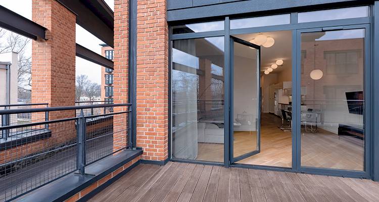 black framed patio door that has triple glazing