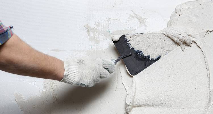 trowel plastering hand