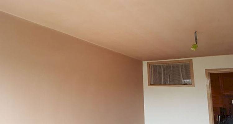 freshly plastered ceiling and wall