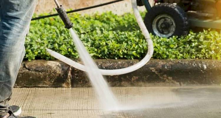 pressure washing a driveway