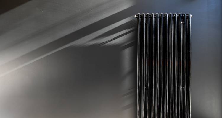 black vertical radiator sunshine