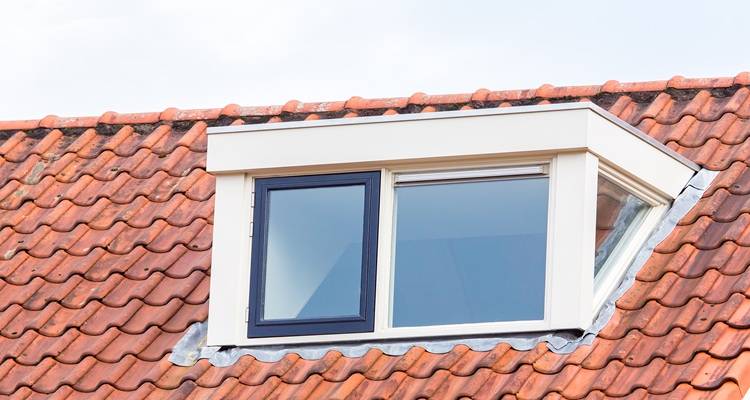 white dormer orange roof