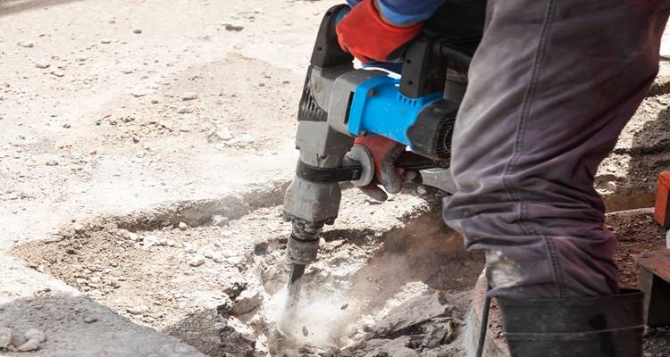 person using jackhammer