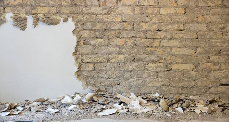 damaged wall render removed