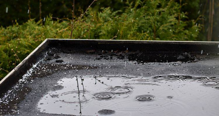 water pooling on garage roof