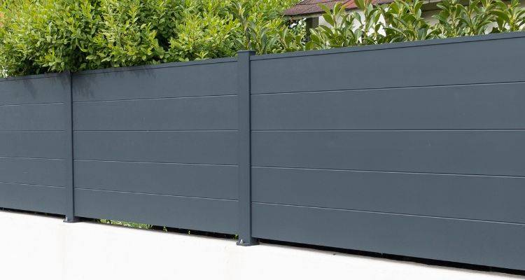 solid metal fence cost