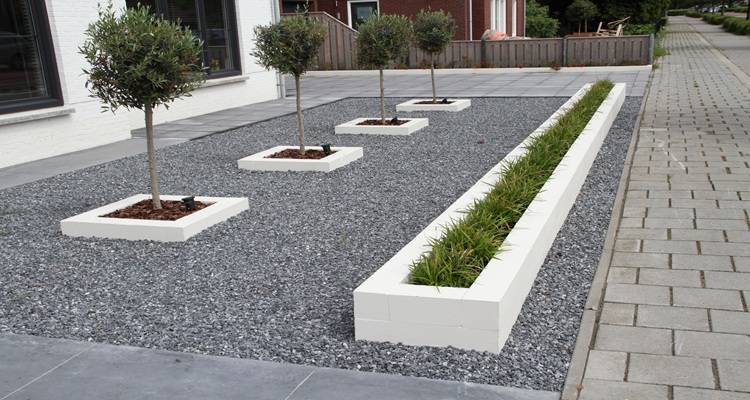 Dark gravel surrounds