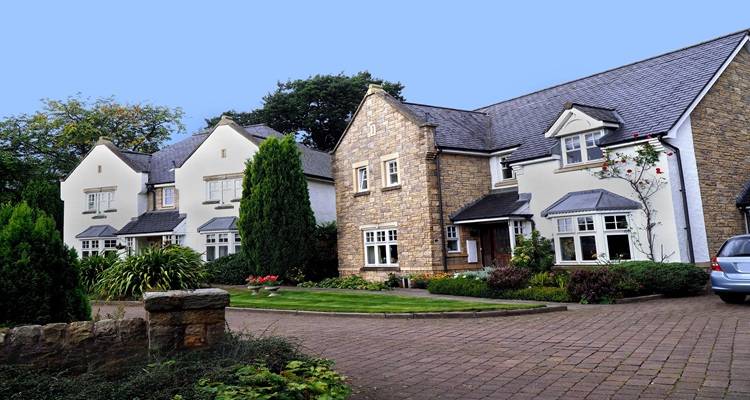 two houses big drive