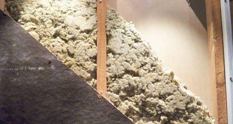 Insulation fitted next to the joists in a UK loft