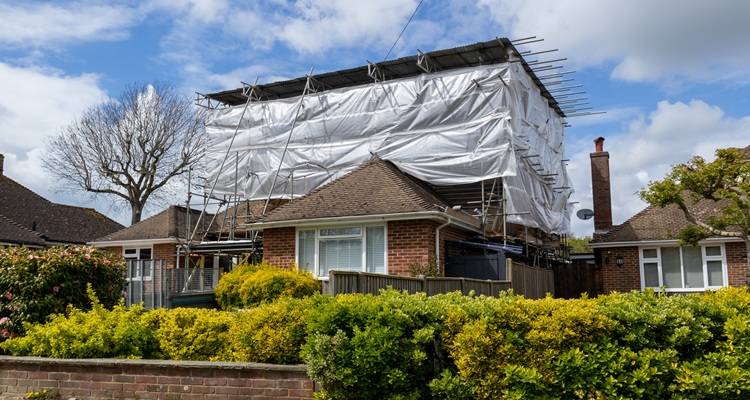 Roof with scaffolding tent