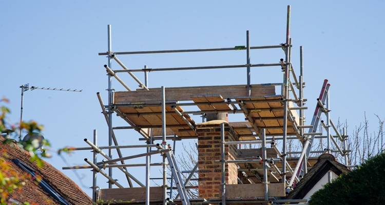 chimney with scaffold around it