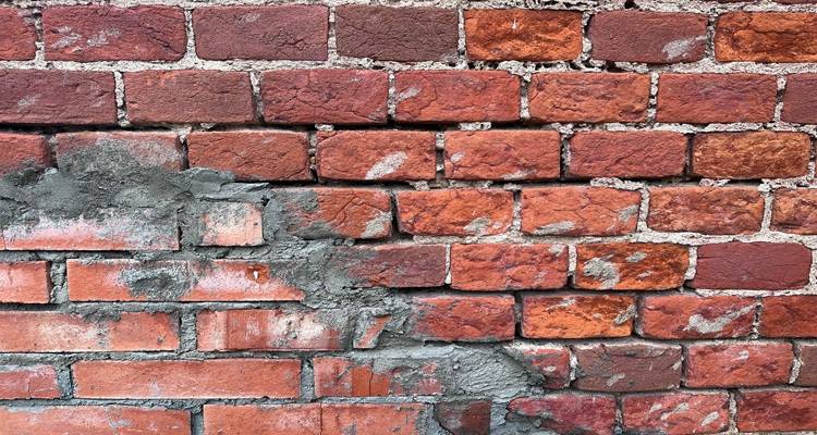damaged brick wall