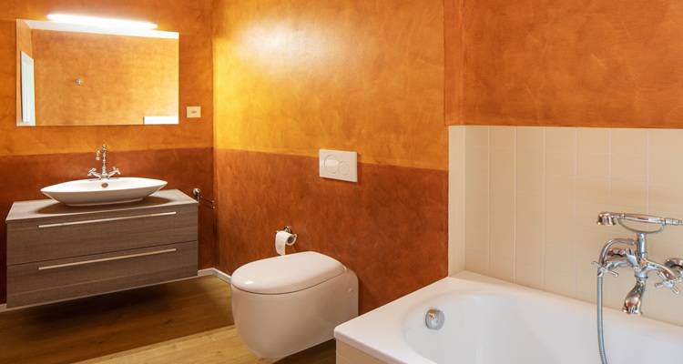 orange venetian bathroom