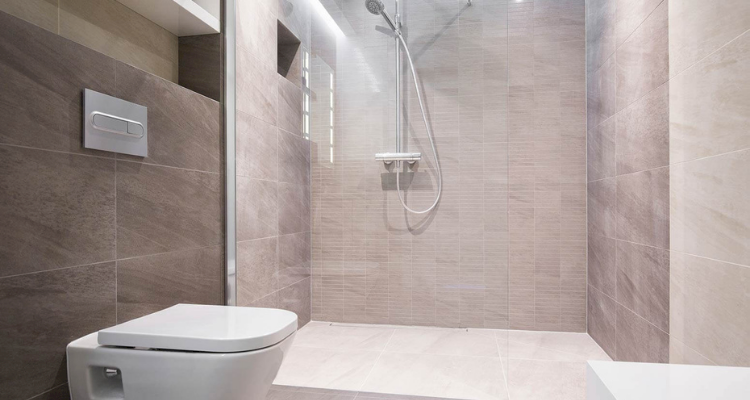 brown and white wetroom with an elevated shower tray