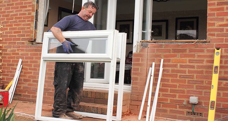 person installing windows