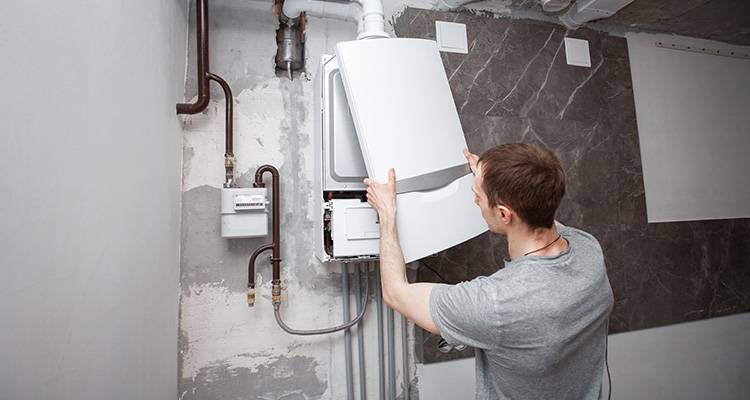 person installing boiler
