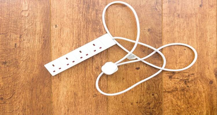 extension lead on wooden floor