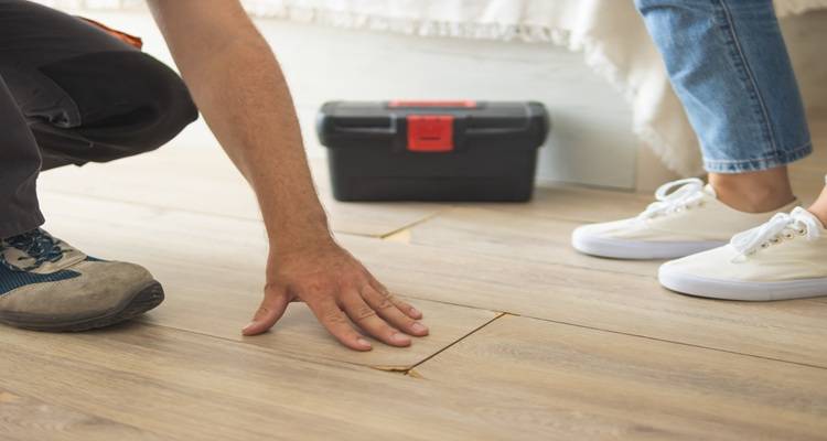 man putting hands on laminate toolbox