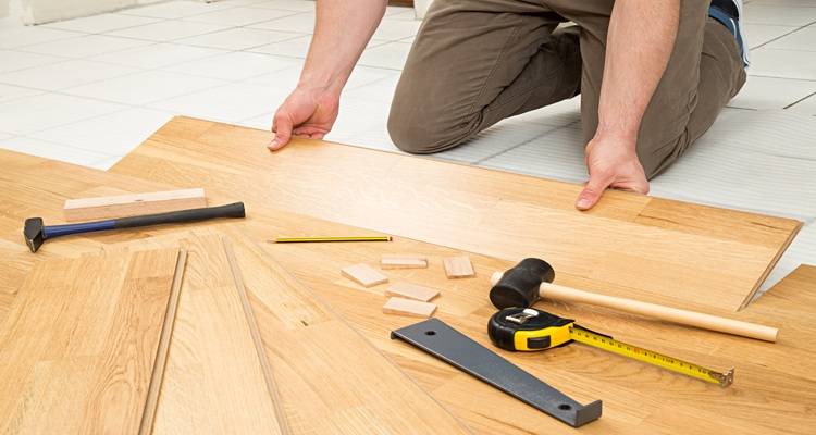 laminate being laid tools foreground