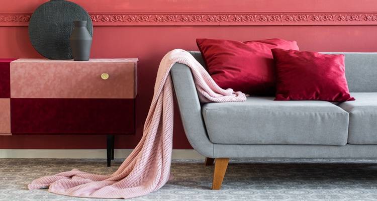 grey sofa burgundy wall